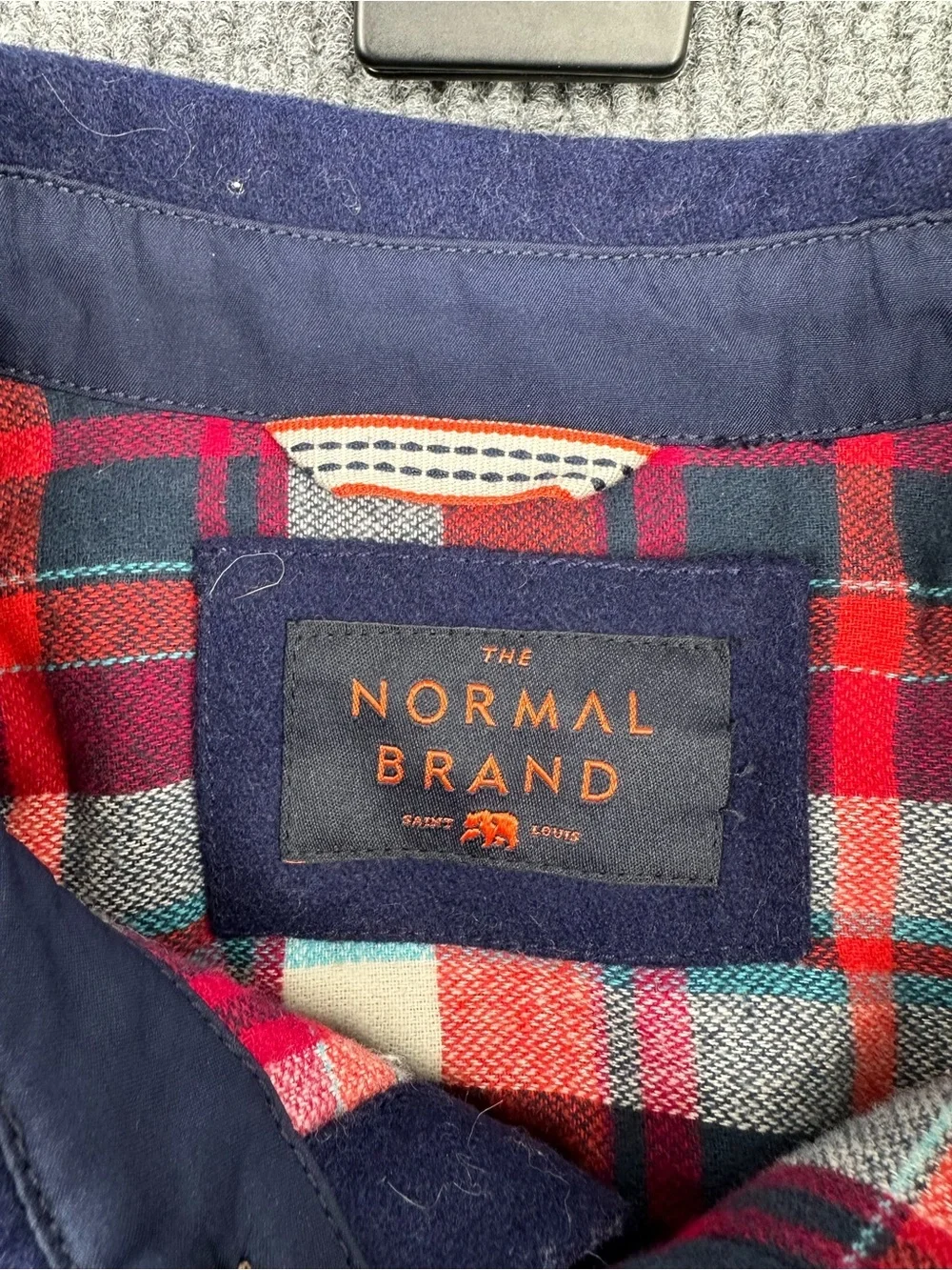 The Normal Brand Navy Jacket with Red and Teal Plaid Lining